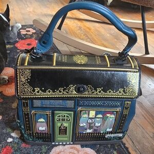 Charming Black and Teal Satchel by Vendula London